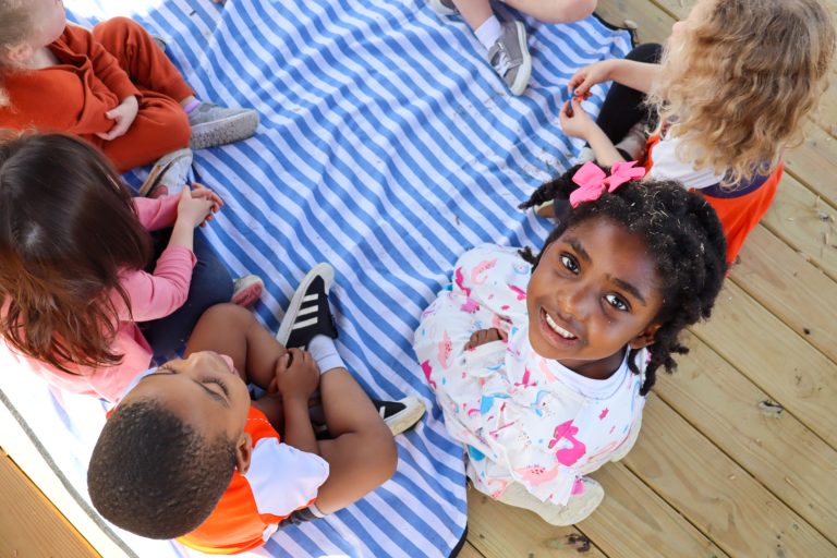 Kids happy with picnic on deck